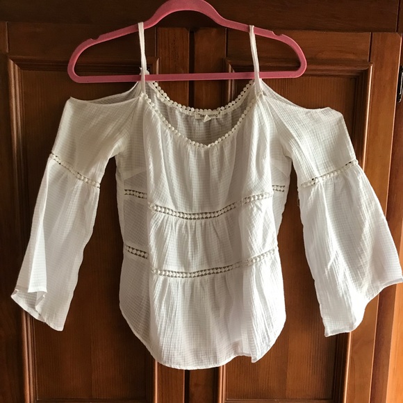 white shoulderless blouse